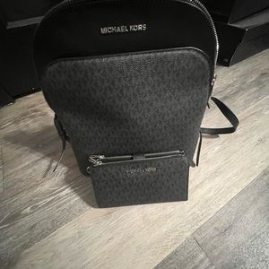 Like New Michael Kors Backpack with matching wallet